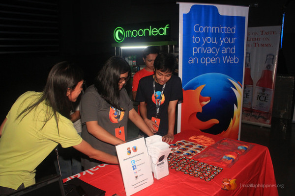 Some of our awesome volunteers for the event setting up the MozillaPH booth.